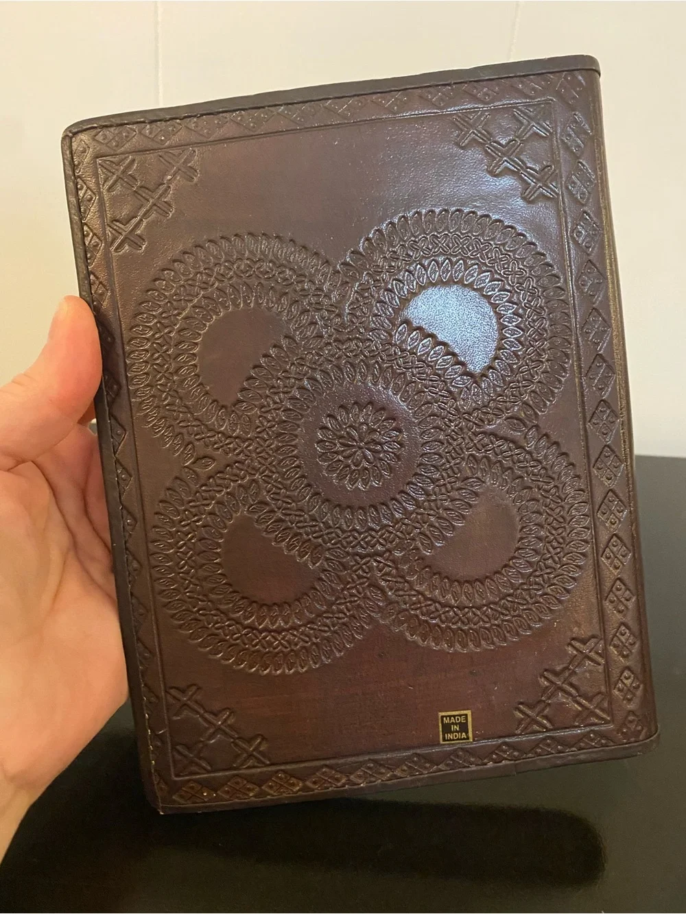 Embossed brown faux leather journal